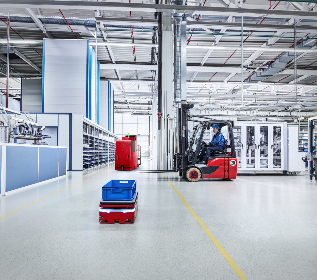 Autonomous Guided Cart (AGC) transports materials through warehouse