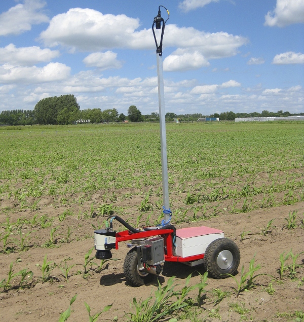 Agricultural robot navigating crop field with 2D laser scanner
