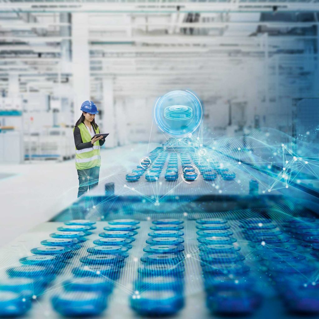 SICK image, woman standing in front of manufacturing process